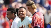 6a3f1447a6116-momen-akrab-kylian-mbappe-bersama-erling-haaland-usai-laga-prancis-vs-norwegia-di-piala-dunia-2026_gemini_1265_711