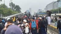 68aee1674a327-ilustrasi-aksi-unjuk-rasa_1265_711